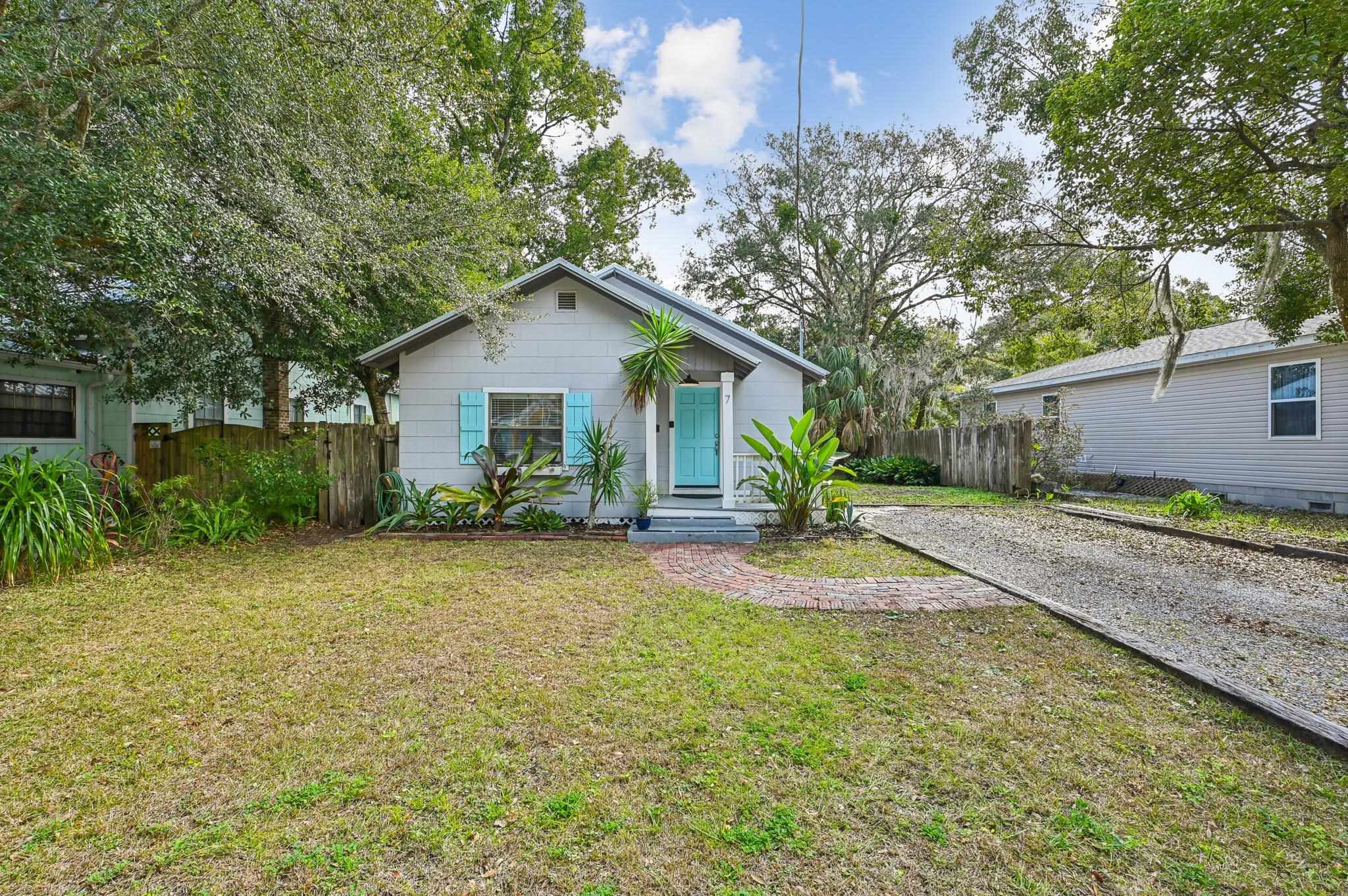 7 Atlantic Avenue St. Augustine, FL 32084 - Photo 3 of 38 a view of a house with a yard and large tree