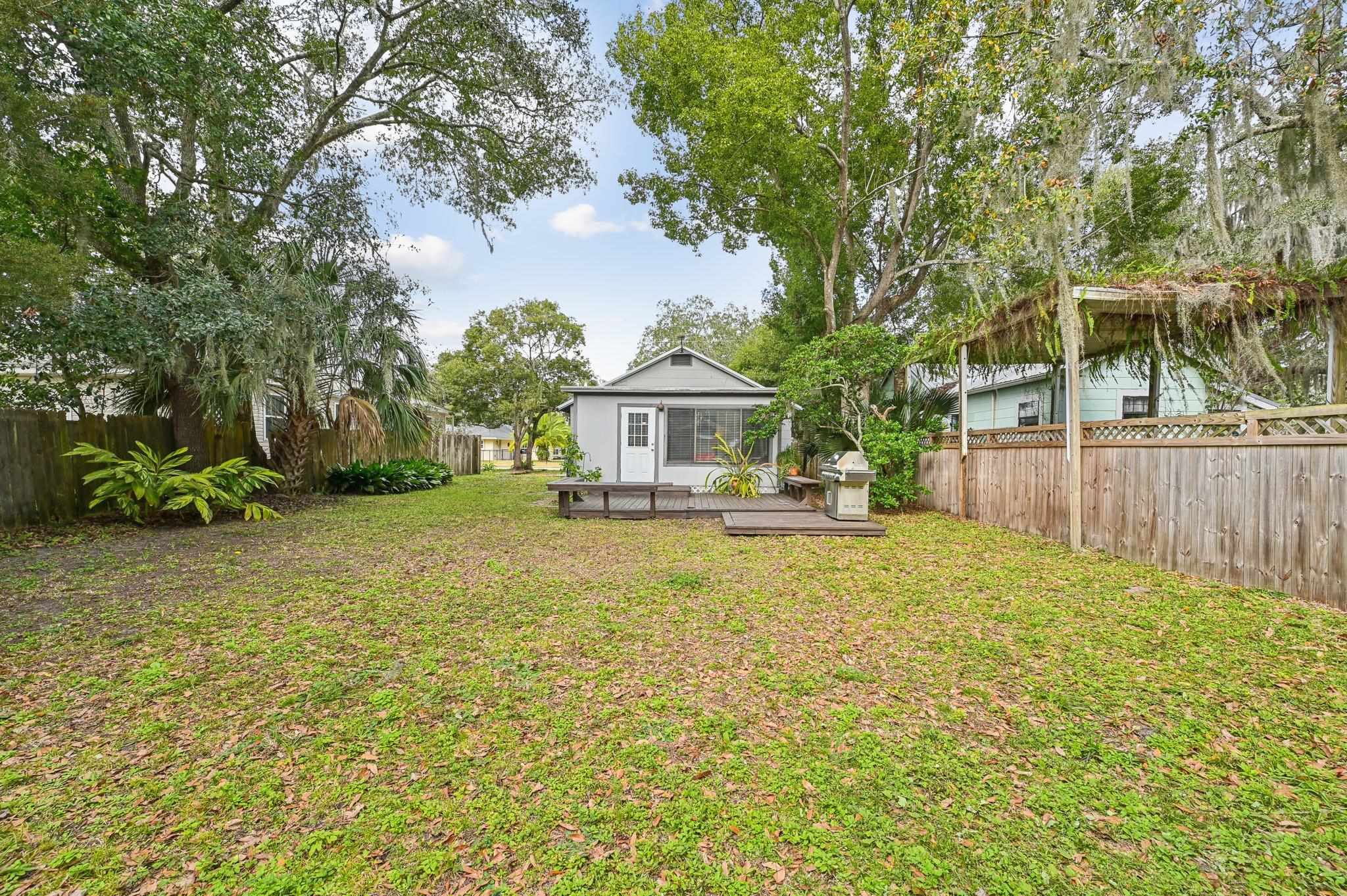 7 Atlantic Avenue St. Augustine, FL 32084 - Photo 31 of 38 front view of a house with a yard