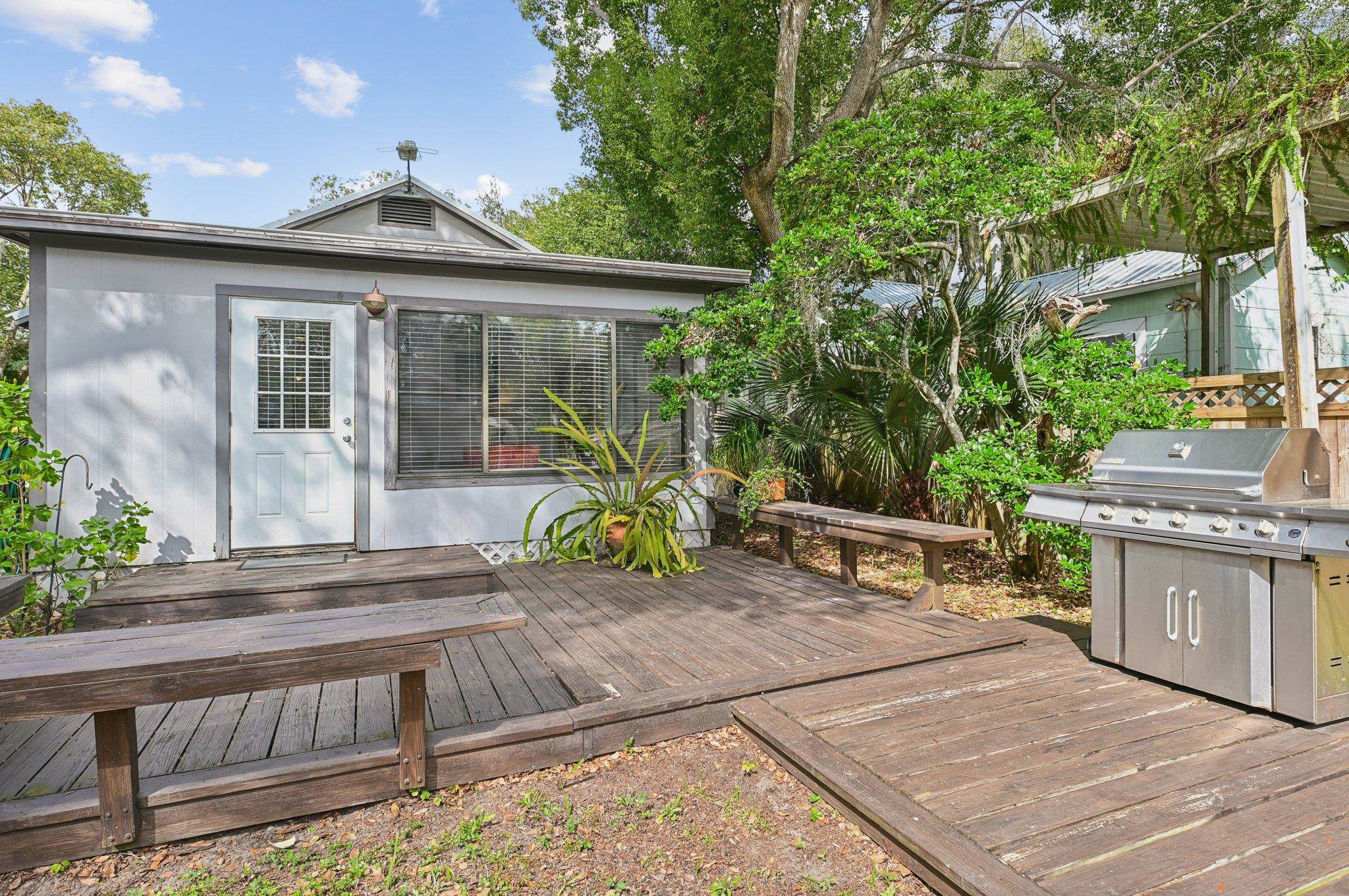 7 Atlantic Avenue St. Augustine, FL 32084 - Photo 35 of 38 a view of a house with backyard and sitting area
