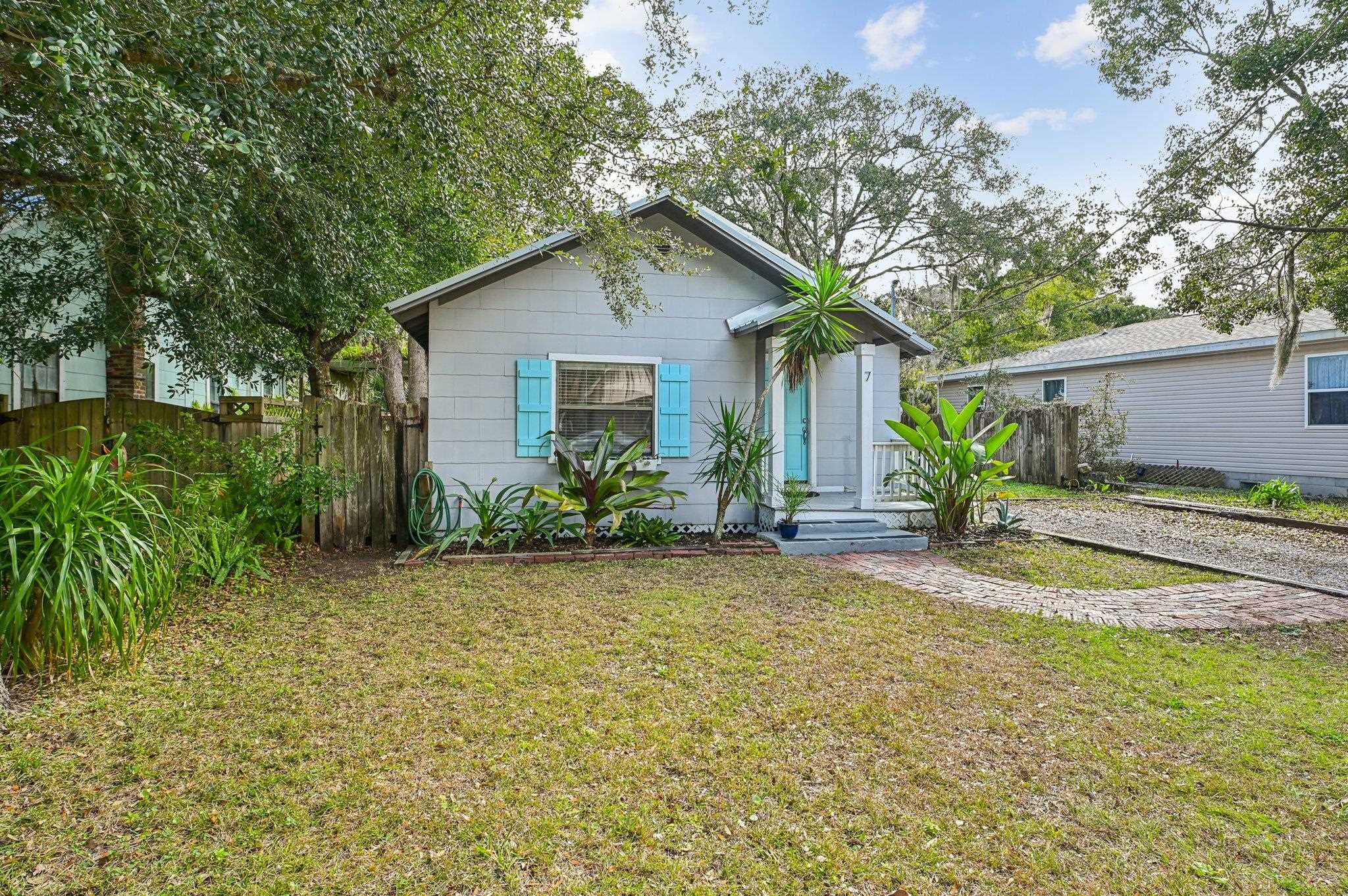 7 Atlantic Avenue St. Augustine, FL 32084 - Photo 4 of 38 a view of a house with backyard and garden