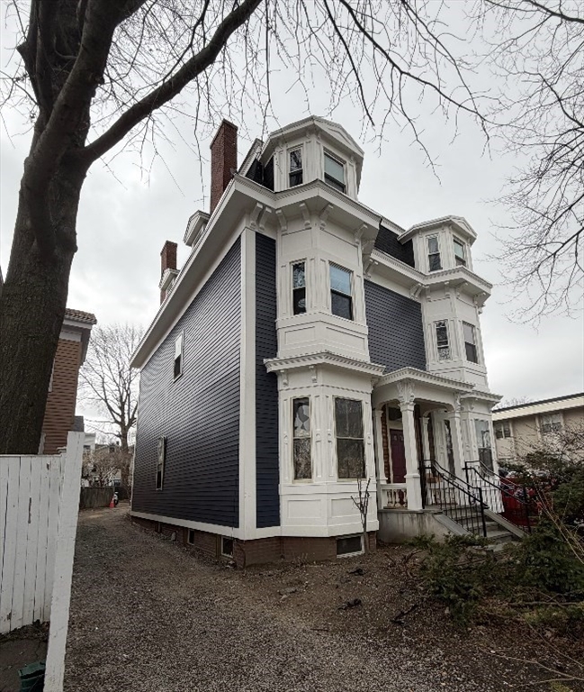 183 Prospect Street, Unit 2 Cambridge, MA 02139 - Photo 11 of 11 a front view of a house with garden