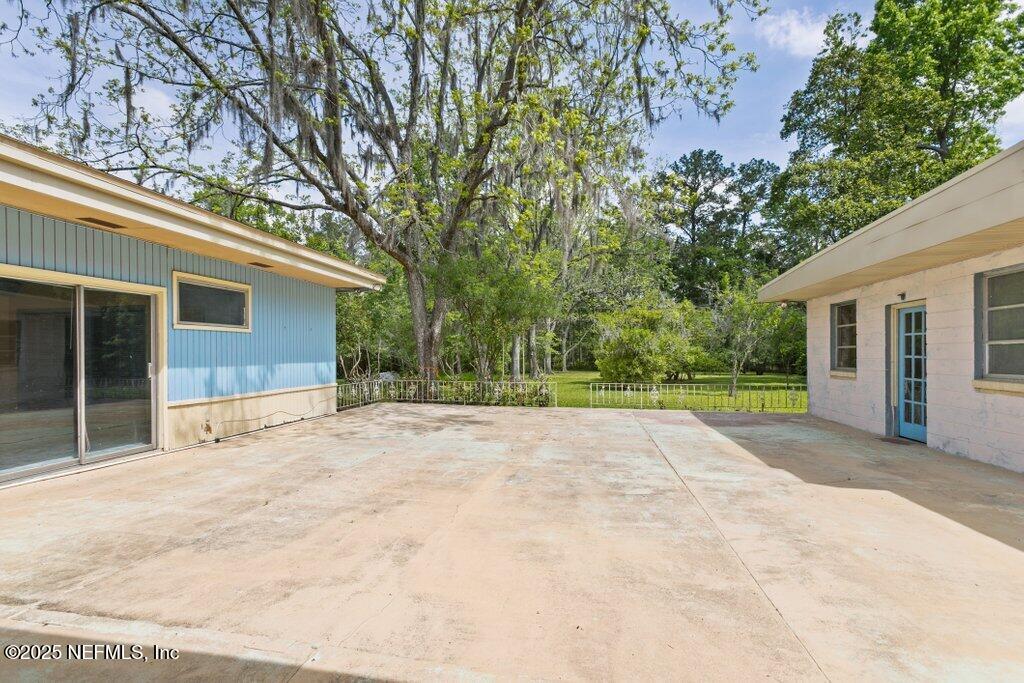 45121 Stratton Road Callahan, FL 32011 - Photo 12 of 24 a view of a house with a backyard