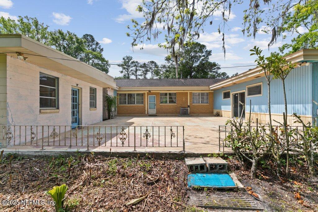 45121 Stratton Road Callahan, FL 32011 - Photo 13 of 24 a front view of a house with garden