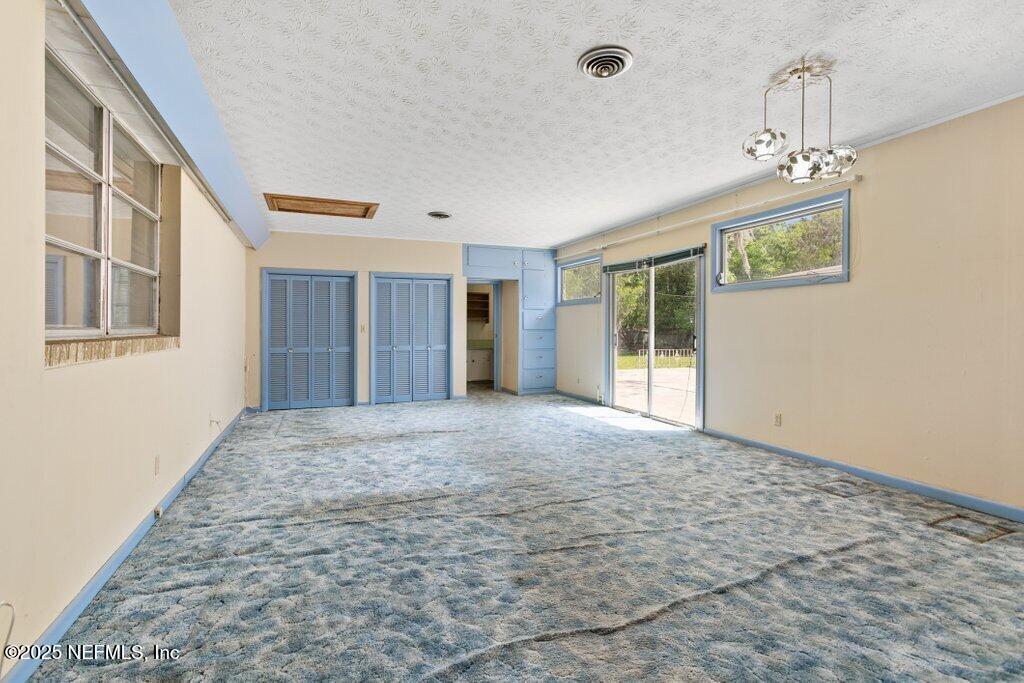 45121 Stratton Road Callahan, FL 32011 - Photo 5 of 24 a view of an empty room with a window