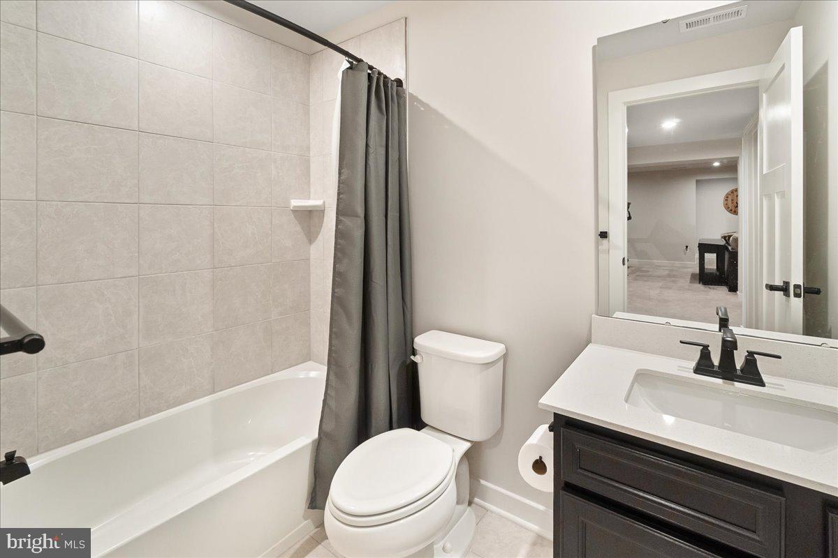 6701 Mt Phillip Road Frederick, MD 21703 - Photo 30 of 51 FULL bath on lower level next to storage area