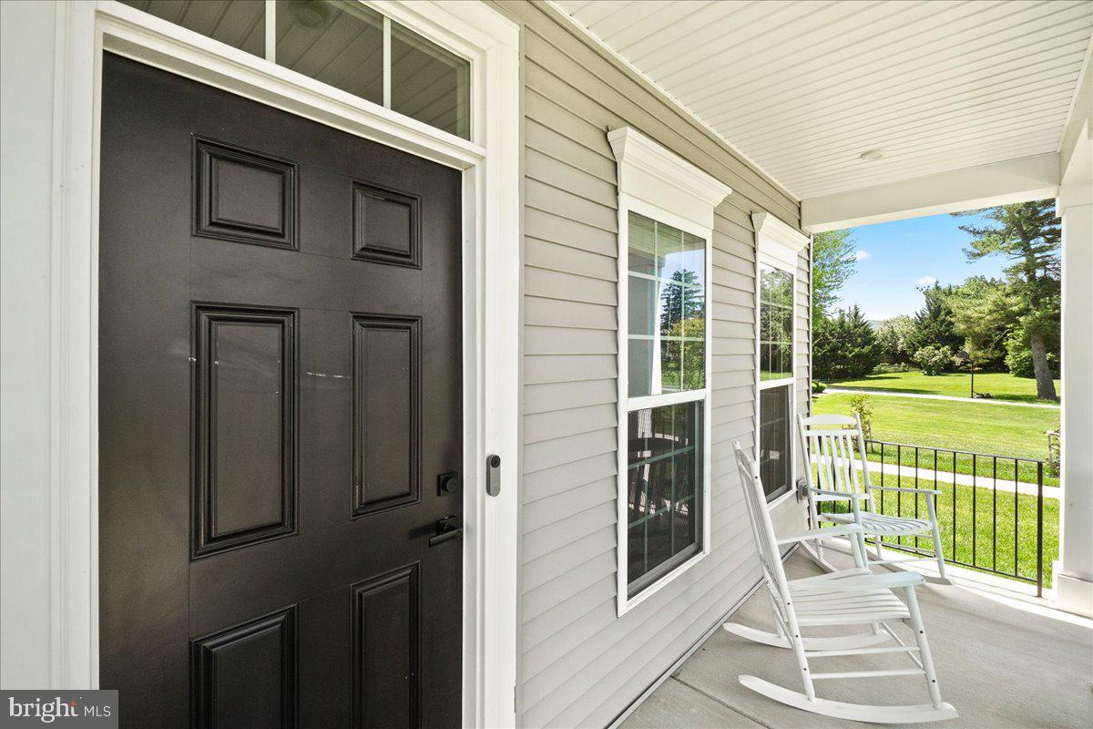 6701 Mt Phillip Road Frederick, MD 21703 - Photo 37 of 51 Front porch with enough room for relaxing vies