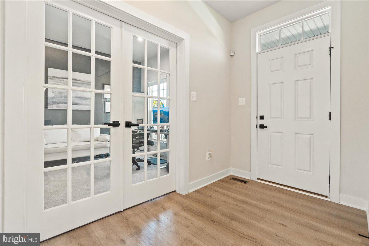 6701 Mt Phillip Road Frederick, MD 21703 - Photo 5 of 51 Front door to Right, French doors to Study/Den