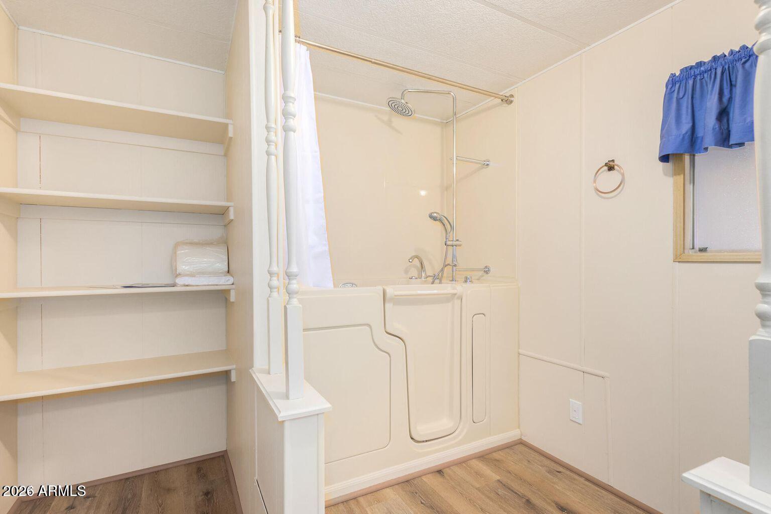5546 East Player Place Mesa, AZ 85215 - Photo 4 of 8 a bathroom with a sink and a mirror