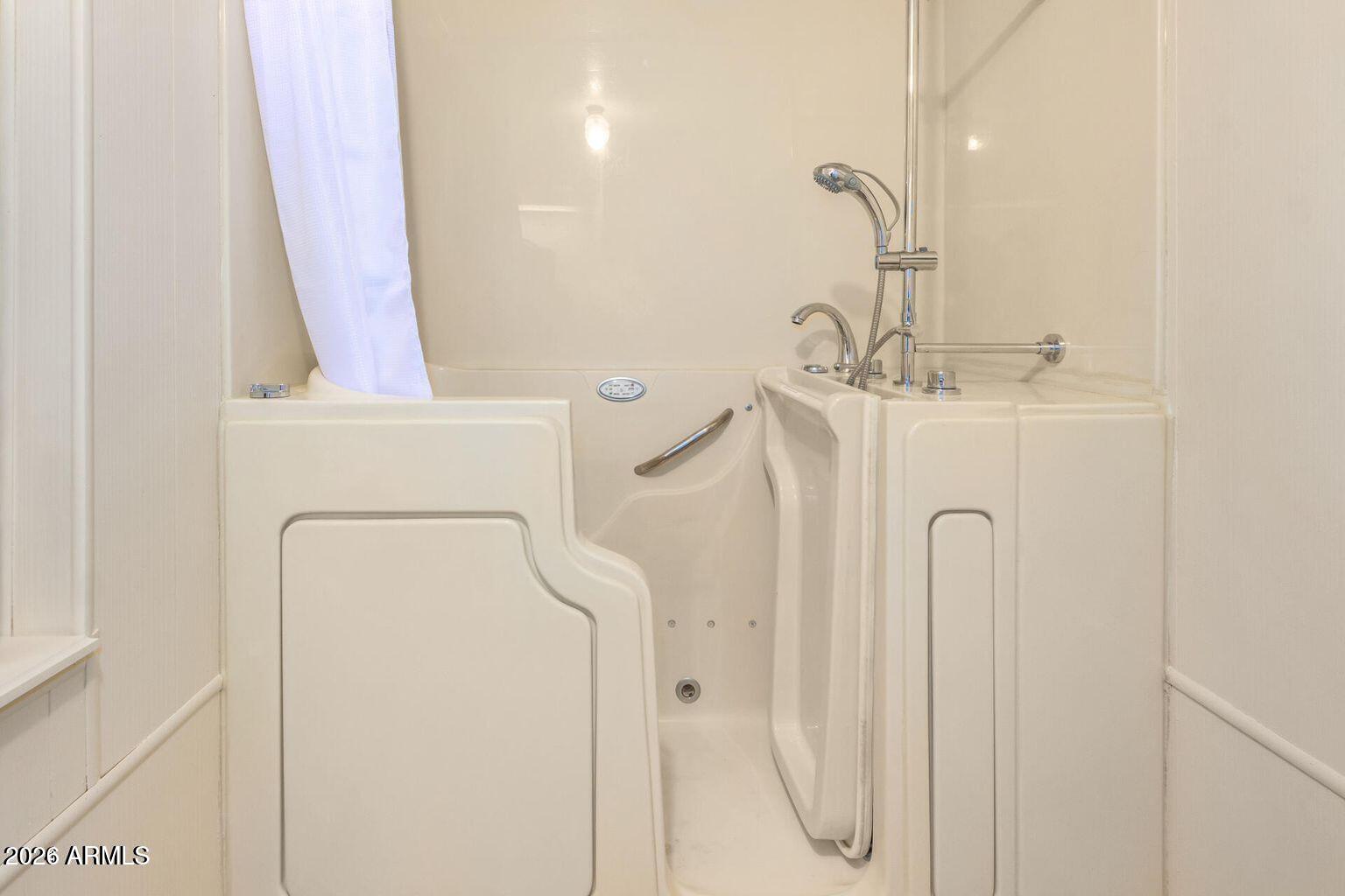 5546 East Player Place Mesa, AZ 85215 - Photo 5 of 8 a bathroom with a shower