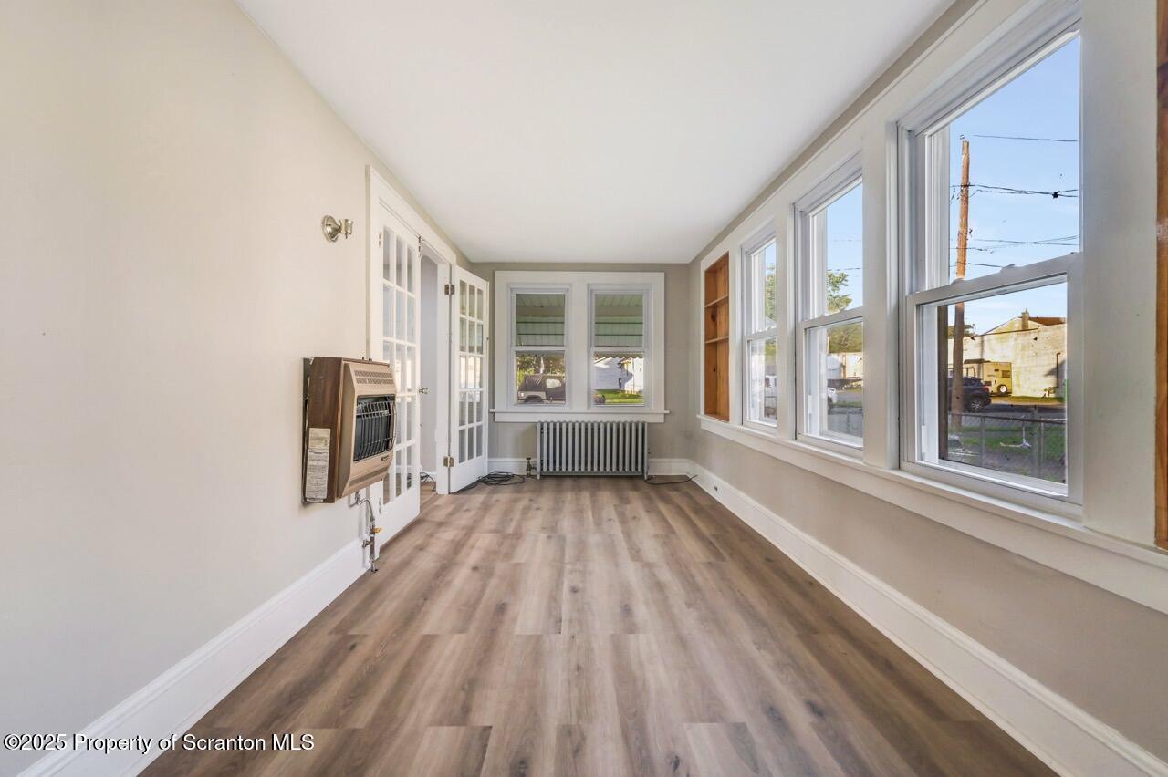 201 Jackson Street Olyphant, PA 18447 - Photo 16 of 70 a view of an entryway with wooden floor