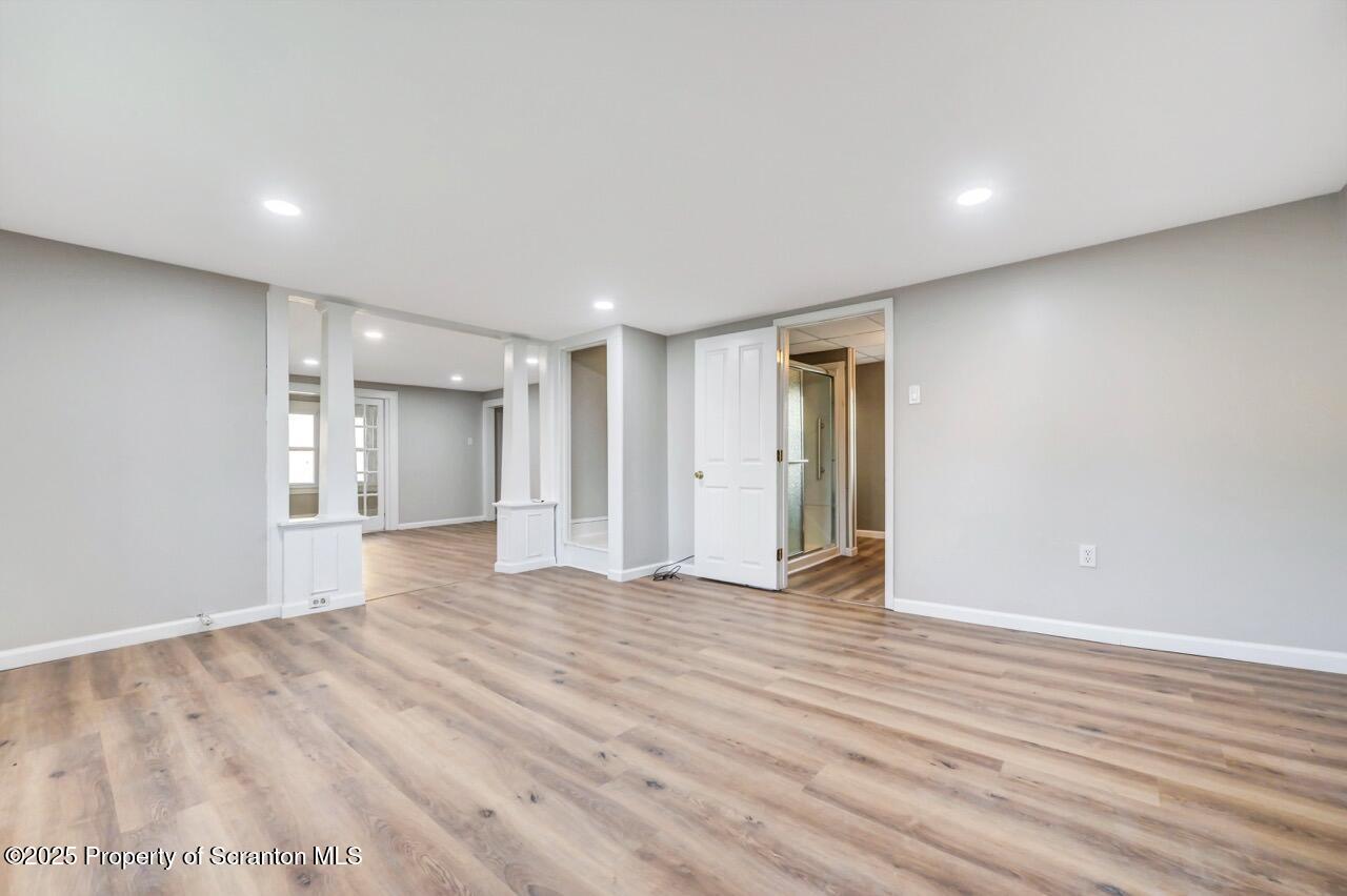 201 Jackson Street Olyphant, PA 18447 - Photo 20 of 70 a view of an empty room with wooden floor