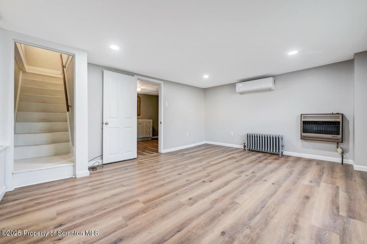 201 Jackson Street Olyphant, PA 18447 - Photo 21 of 70 a view of empty room with wooden floor and fan