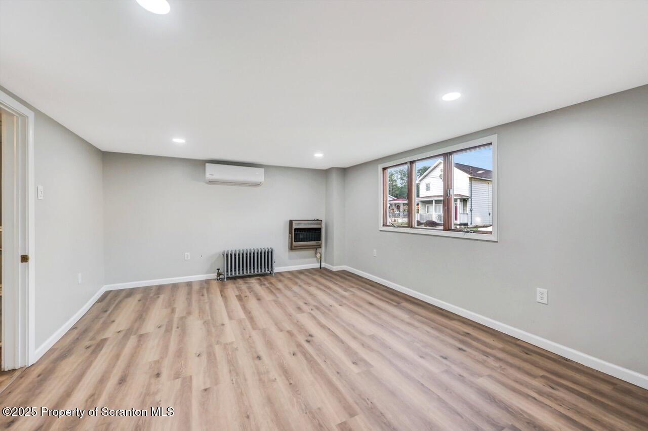 201 Jackson Street Olyphant, PA 18447 - Photo 22 of 70 a view of empty room with wooden floor