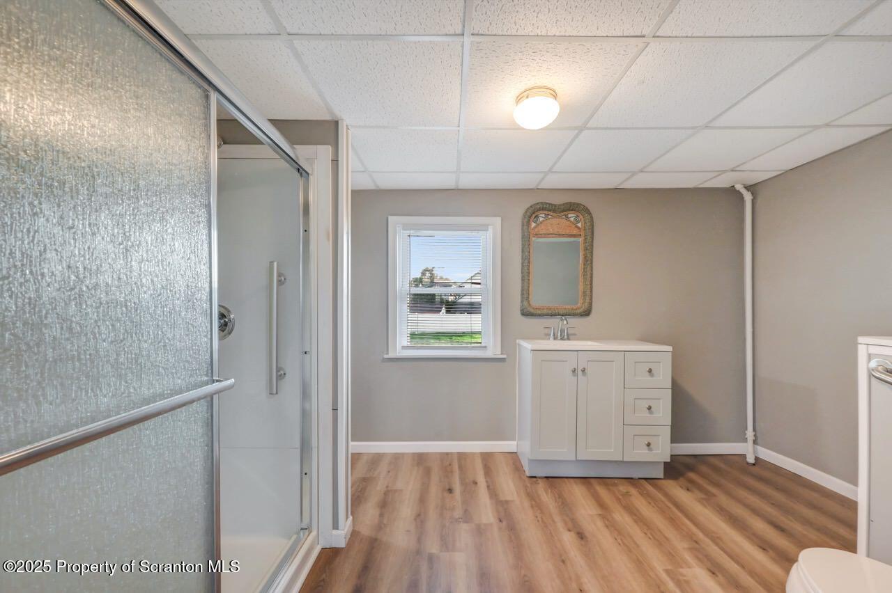 201 Jackson Street Olyphant, PA 18447 - Photo 30 of 70 a view of a livingroom with wooden floor and cabinet