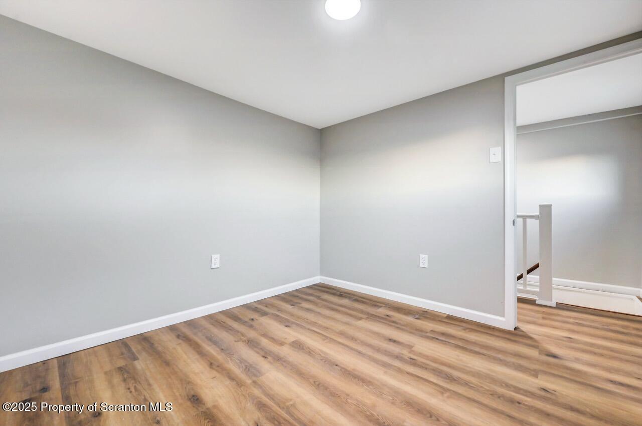 201 Jackson Street Olyphant, PA 18447 - Photo 38 of 70 wooden floor in an empty room