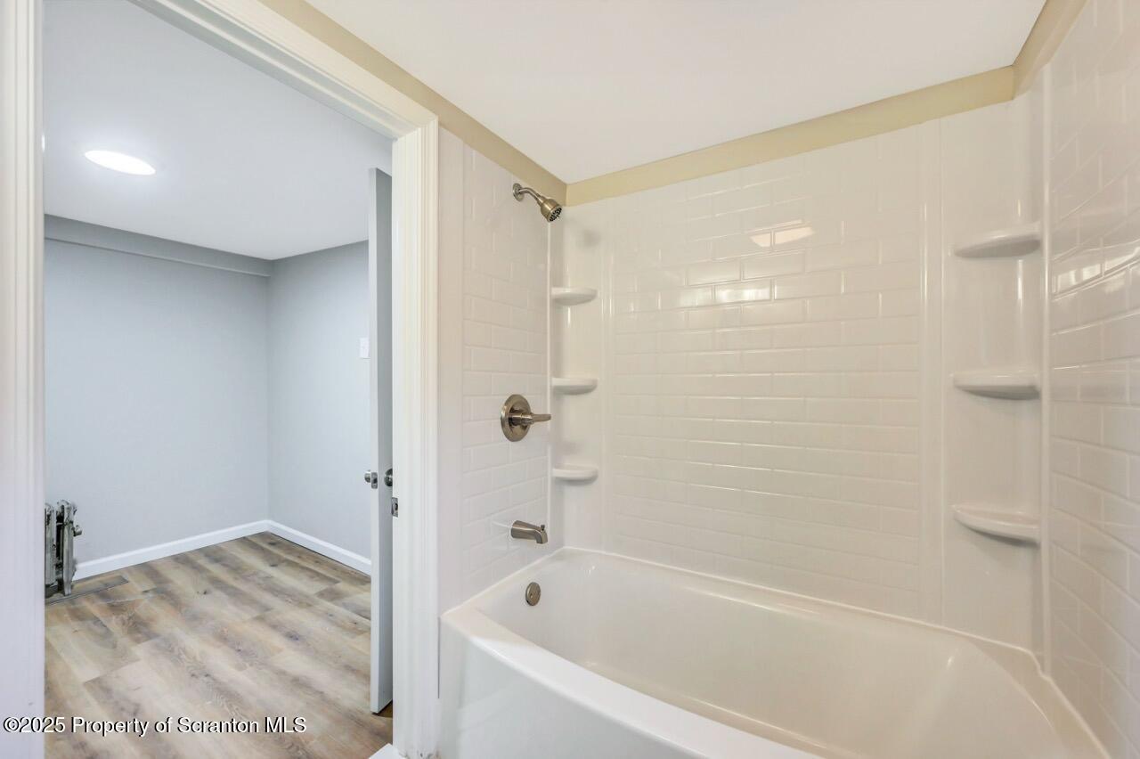201 Jackson Street Olyphant, PA 18447 - Photo 53 of 70 a bathroom with a bathtub and shower