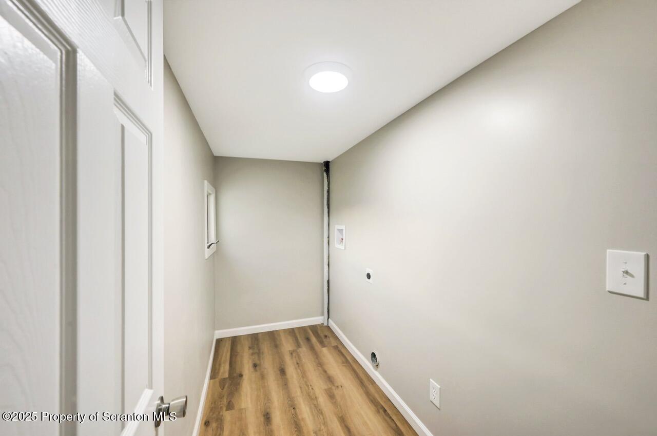 201 Jackson Street Olyphant, PA 18447 - Photo 54 of 70 a view of hallway with wooden floor