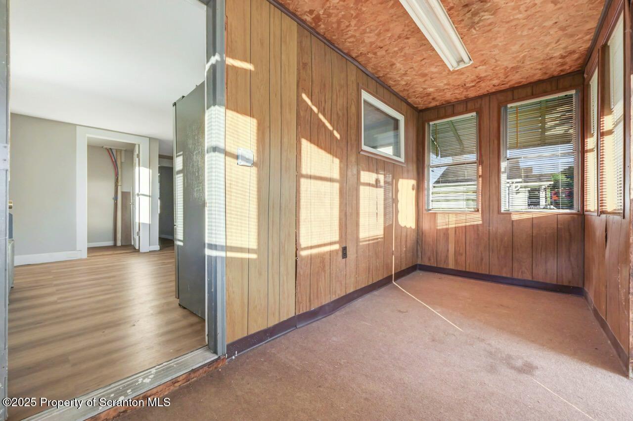 201 Jackson Street Olyphant, PA 18447 - Photo 57 of 70 a view of an entryway with wooden floor and windows