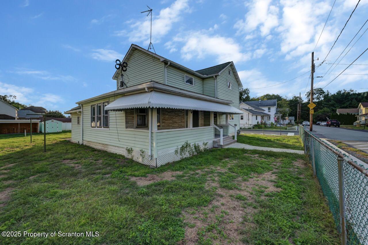 201 Jackson Street Olyphant, PA 18447 - Photo 63 of 70 a house view with a garden space