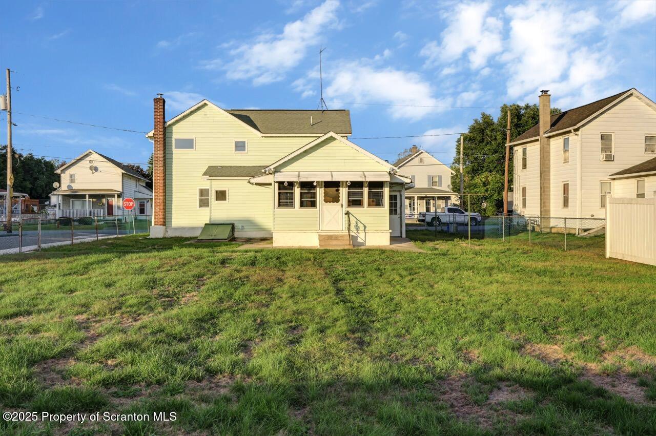 201 Jackson Street Olyphant, PA 18447 - Photo 65 of 70 a front view of a house with a yard