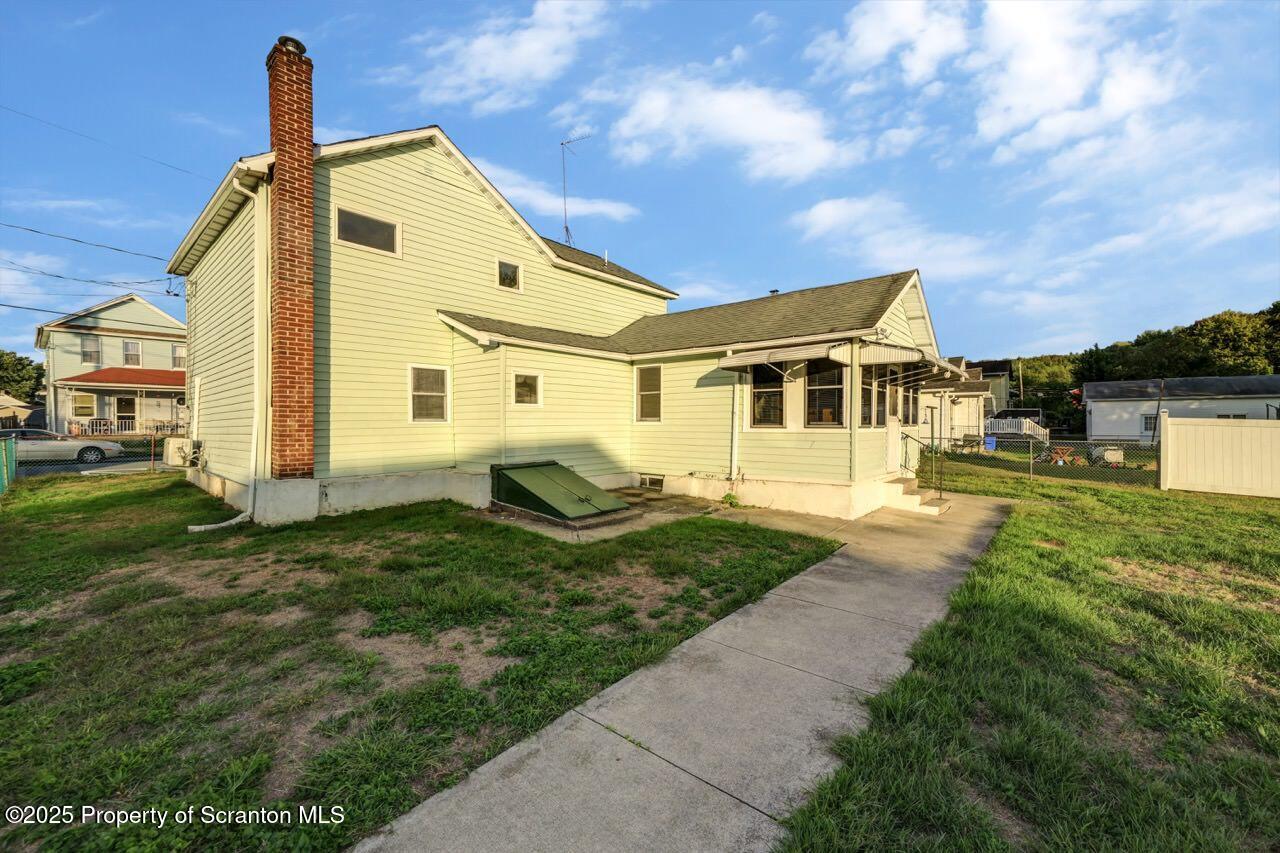 201 Jackson Street Olyphant, PA 18447 - Photo 67 of 70 a front view of a house with a yard