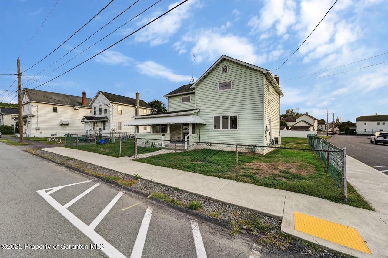 201 Jackson Street Olyphant, PA 18447 - Photo 69 of 70 a front view of a house with a yard