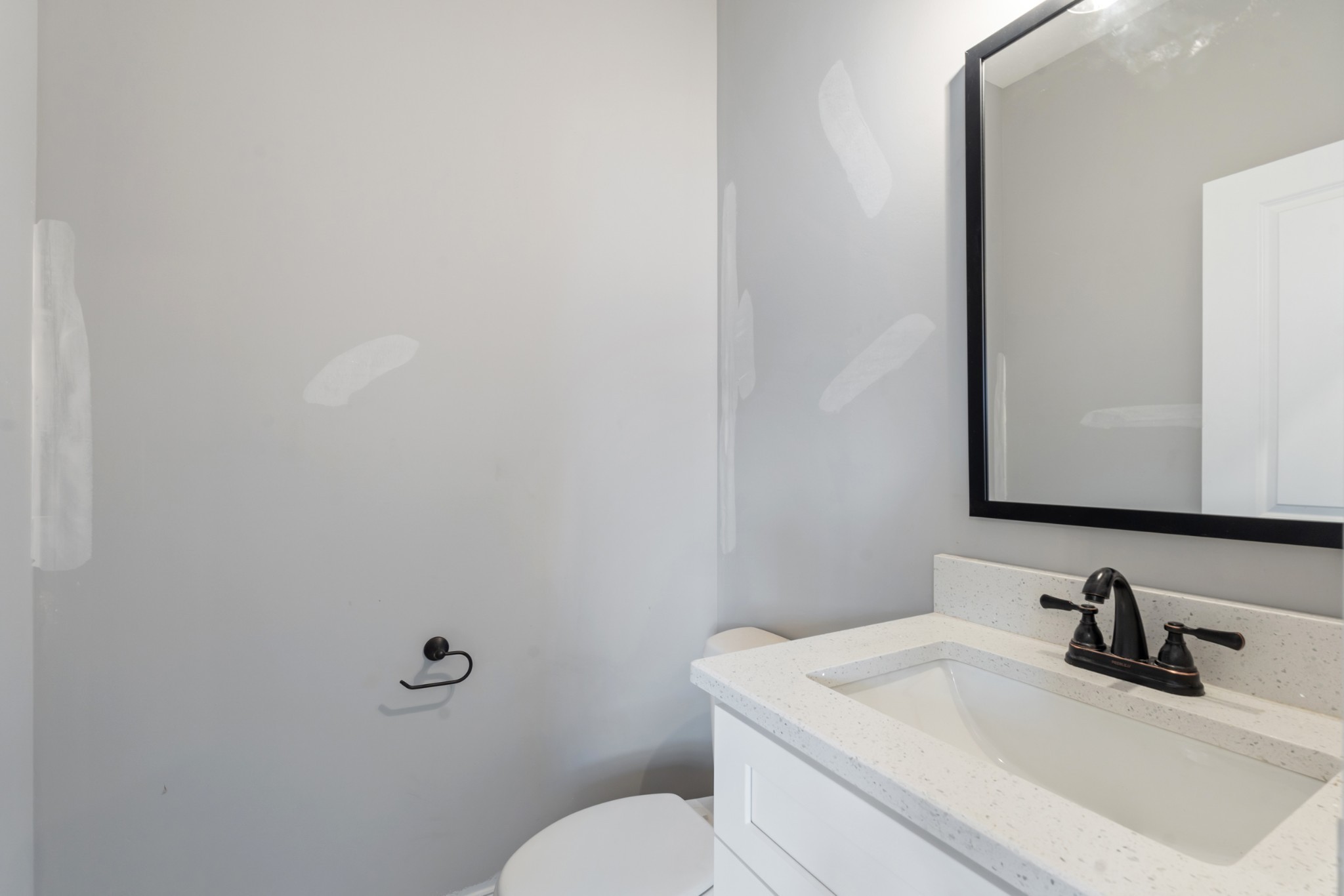 87 Charlotte Road Clarksville, TN 37040 - Photo 13 of 26 a bathroom with a sink toilet and mirror