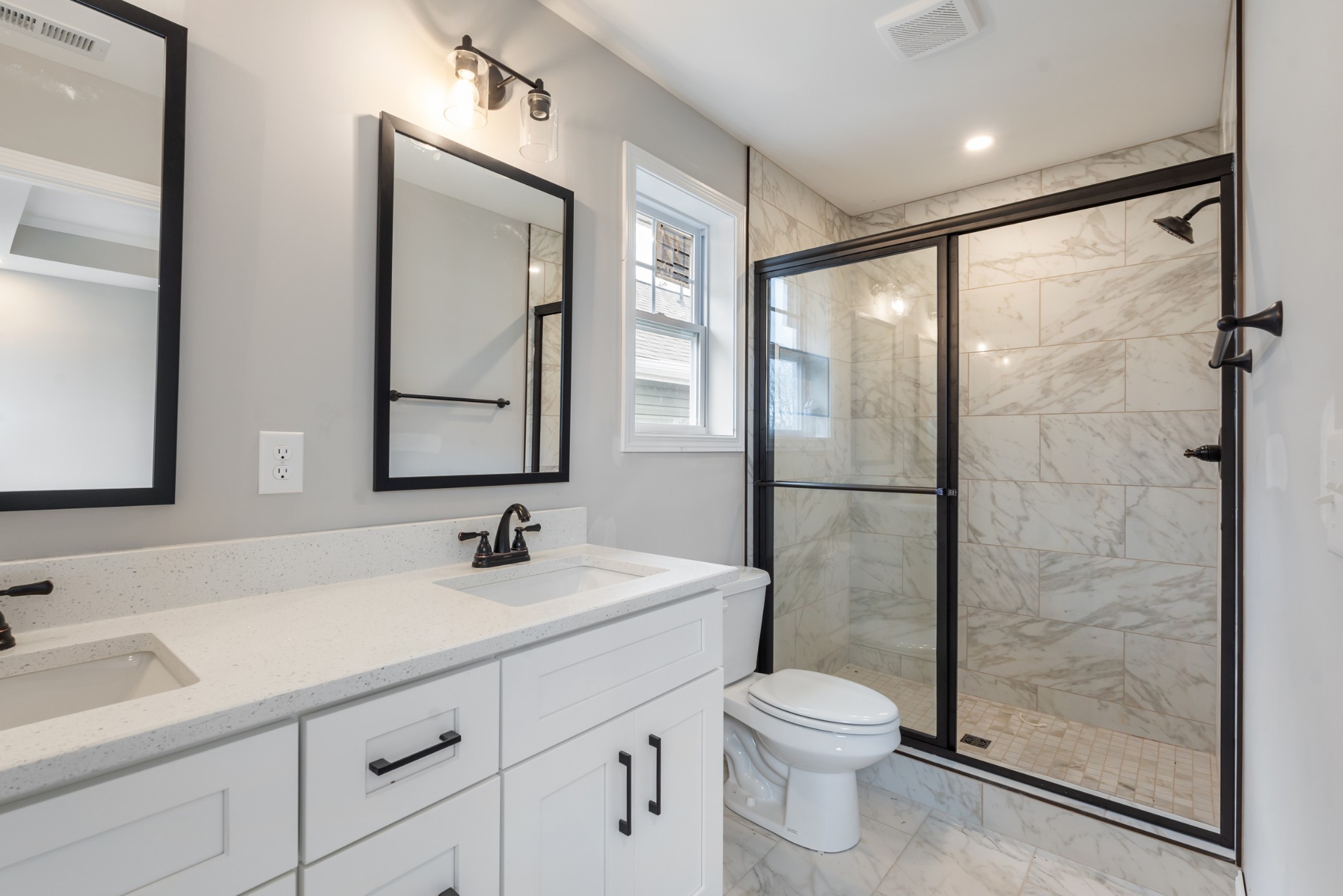 87 Charlotte Road Clarksville, TN 37040 - Photo 17 of 26 a bathroom with a toilet a sink and a mirror