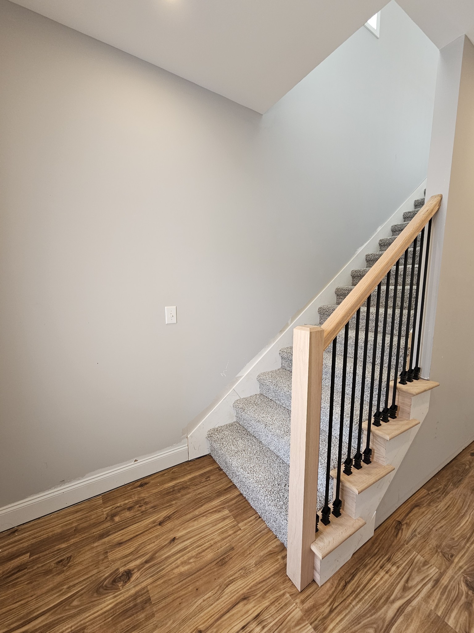 87 Charlotte Road Clarksville, TN 37040 - Photo 4 of 26 a view of a hallway with wooden floor and staircase