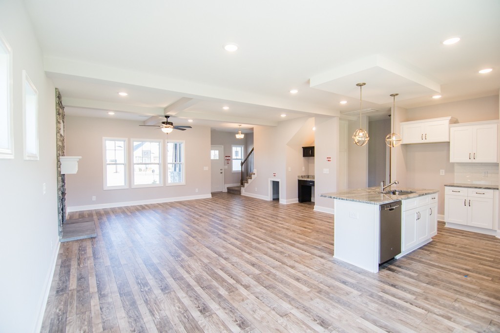 223 Cherry Fields Clarksville, TN 37042 - Photo 4 of 8 a large kitchen with hardwood floor and a sink