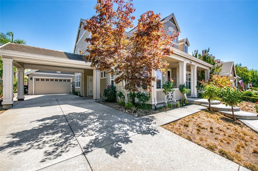 3036 Bresso Drive Livermore, CA 94550 - Photo 3 of 4 a view of a house with a yard and potted plants