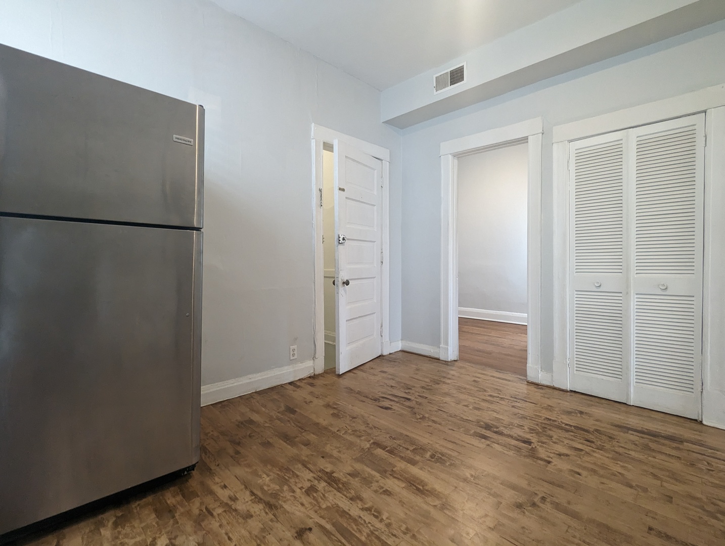 3544 North Halsted Street, Unit 3F Chicago, IL 60657 - Photo 23 of 28 a view of a room with an empty space