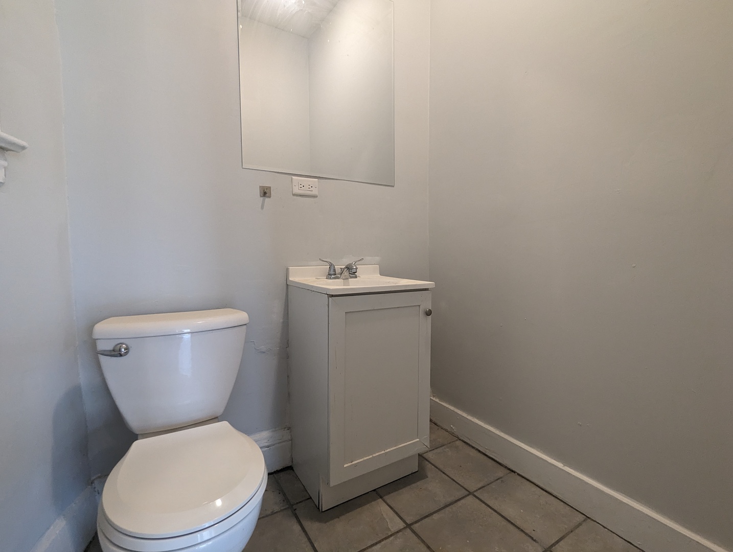3544 North Halsted Street, Unit 3F Chicago, IL 60657 - Photo 9 of 28 a white toilet sitting next to a white sink