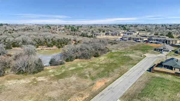 a view of a lake with a city