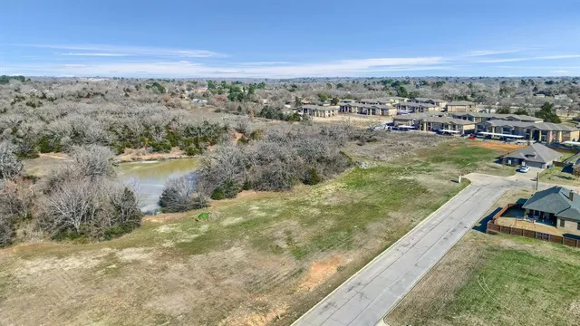 a view of a lake with a city