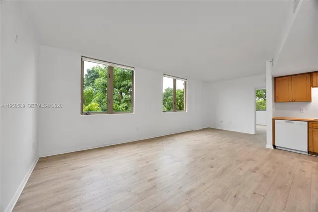 an empty room with windows