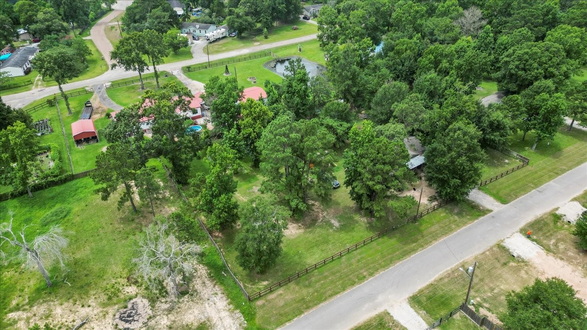 21658 County Road 3749D Cleveland, TX 77327 - Photo 21 of 26 a view of a garden
