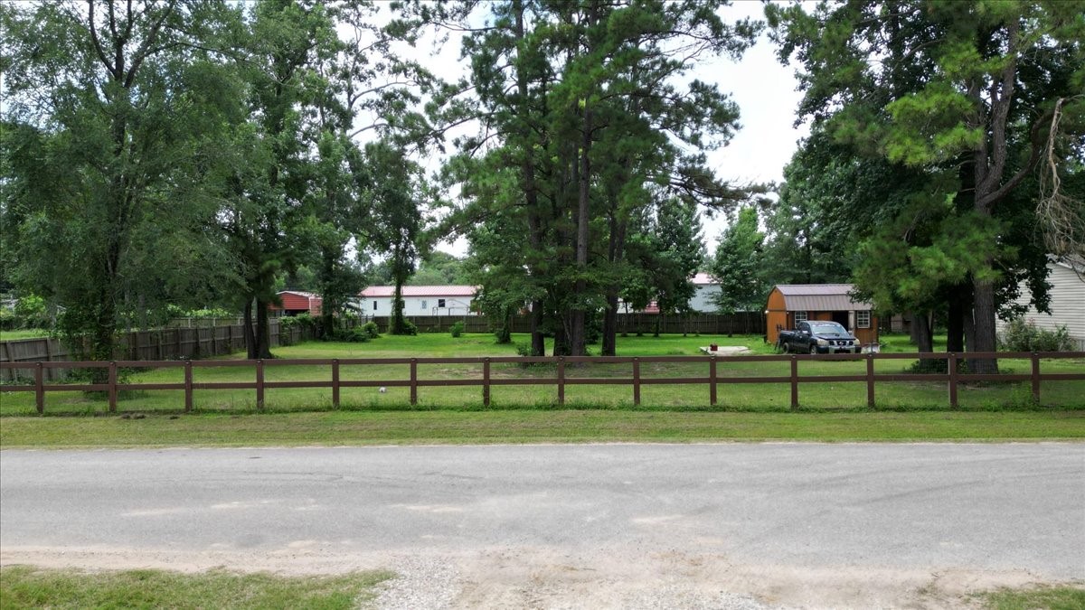 21658 County Road 3749D Cleveland, TX 77327 - Photo 26 of 26 a view of a park with large trees