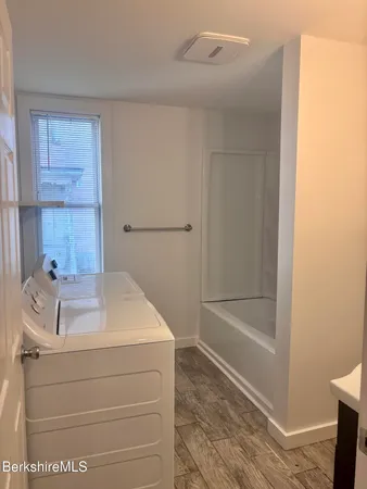 a bathroom with a sink and a bathtub