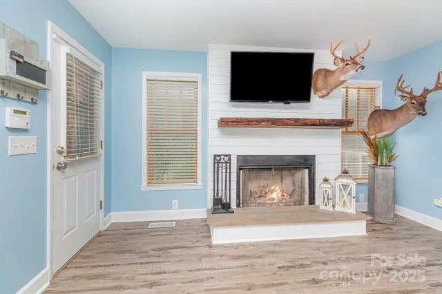 a kitchen with a refrigerator and a stove