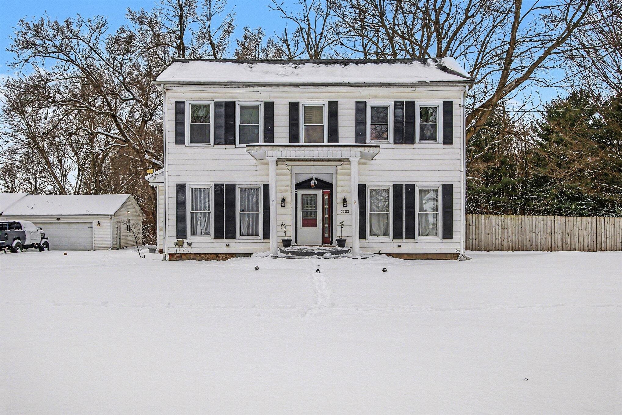 front view of house with a yard