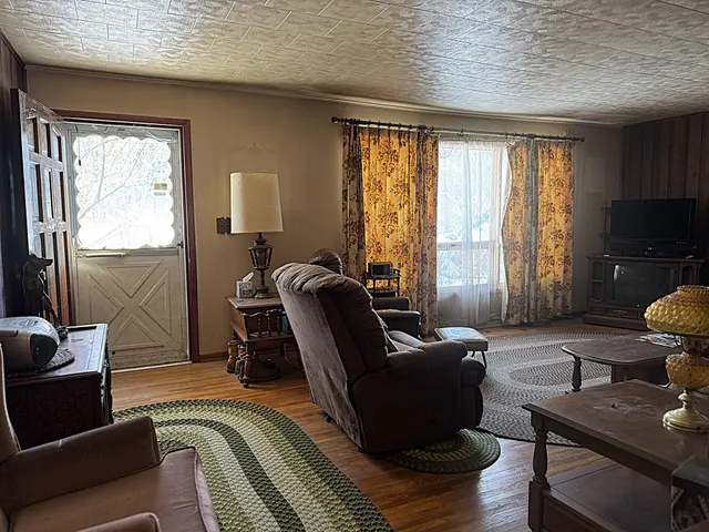 a living room with furniture and a couch