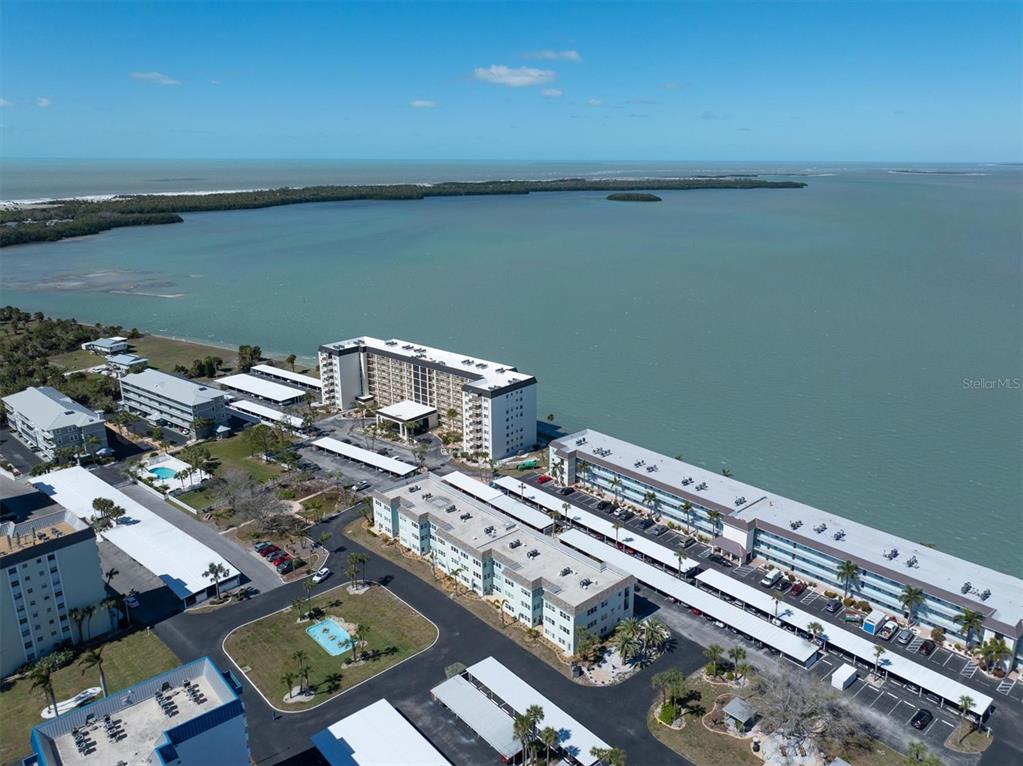 8 Glencoe Place, Unit 105 Dunedin, FL 34698 - Photo 33 of 44 an aerial view of a ocean view