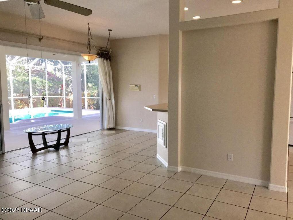 90 Buschman Drive Ponce Inlet, FL 32127 - Photo 14 of 37 a view of a room with furniture and a window