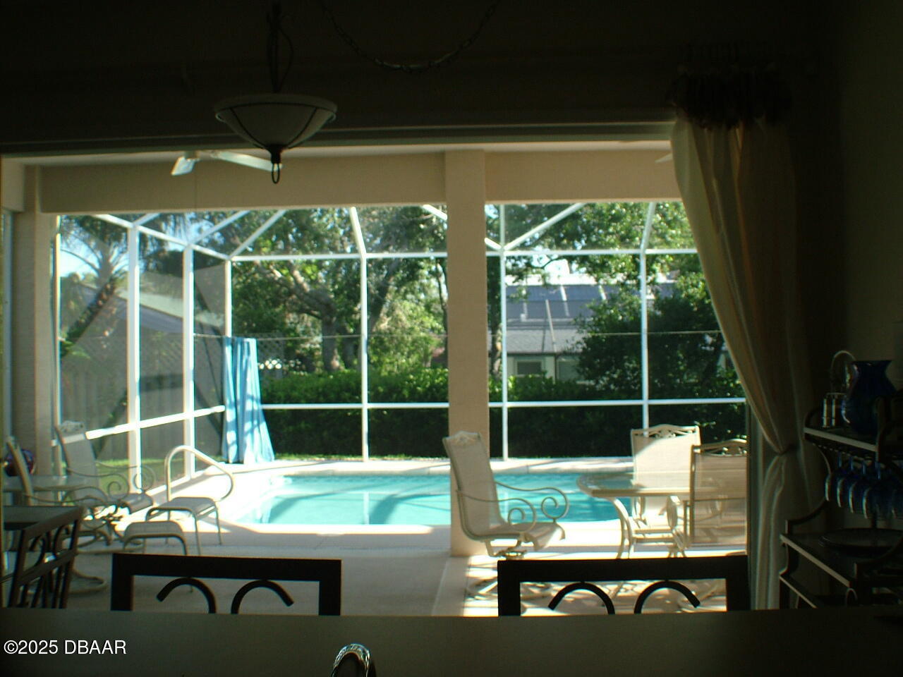 90 Buschman Drive Ponce Inlet, FL 32127 - Photo 17 of 37 a room with furniture and a large window