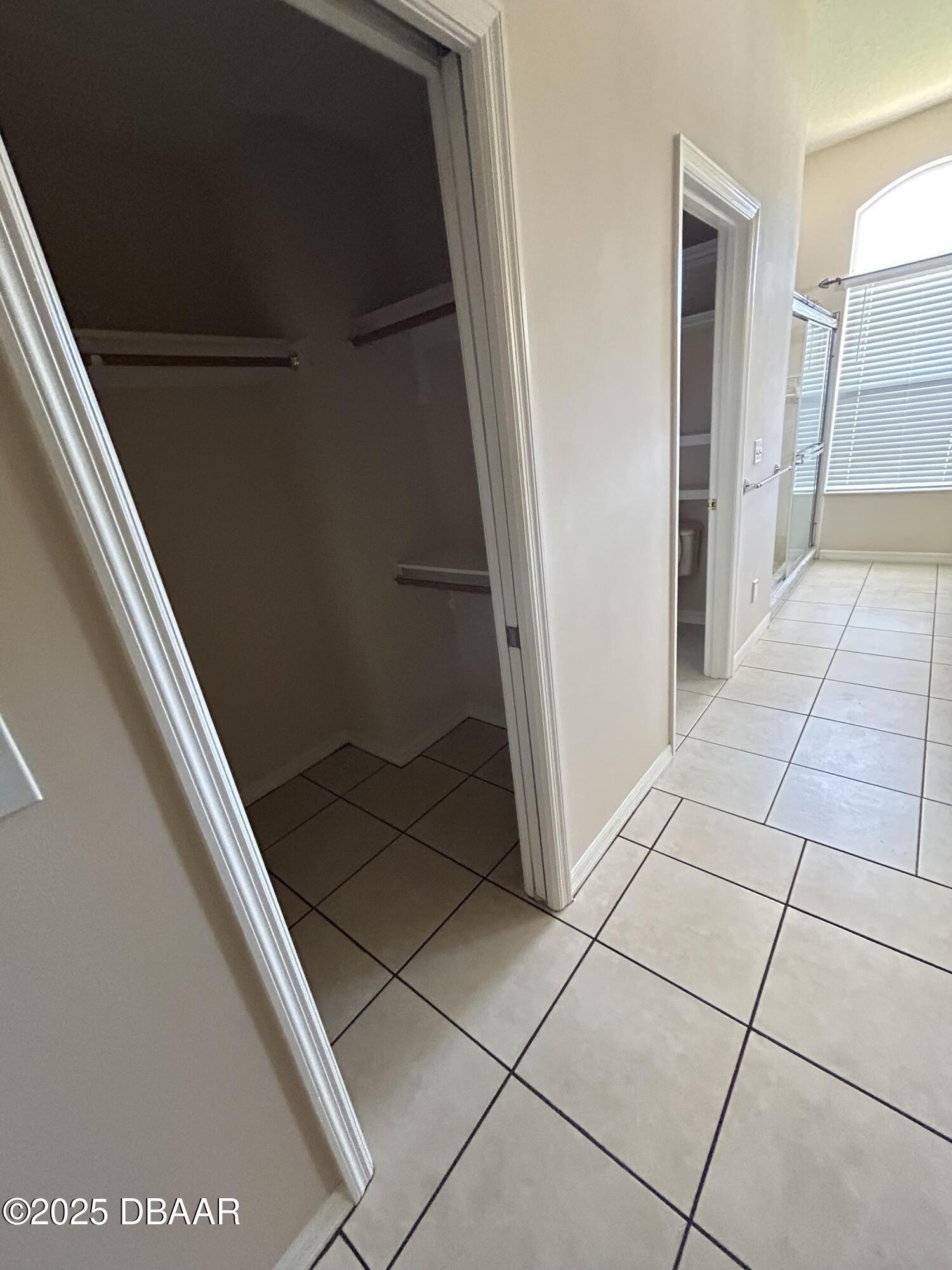 90 Buschman Drive Ponce Inlet, FL 32127 - Photo 18 of 37 a view of an empty walk in closet