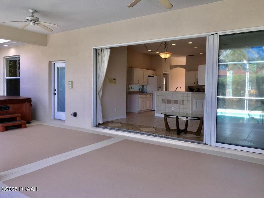 90 Buschman Drive Ponce Inlet, FL 32127 - Photo 19 of 37 a spacious bathroom with a mirror and a shower