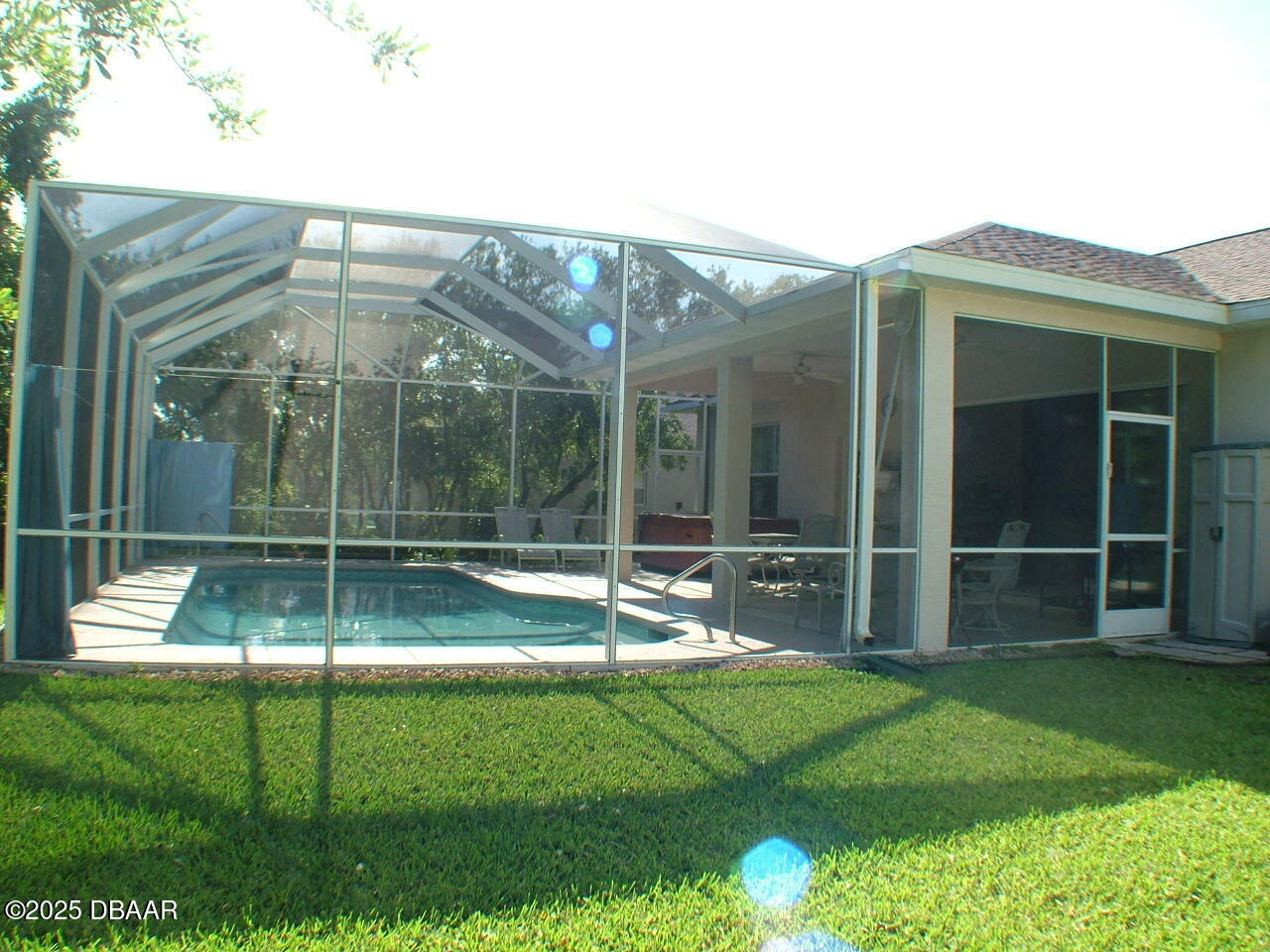 90 Buschman Drive Ponce Inlet, FL 32127 - Photo 29 of 37 a view of a house with a backyard