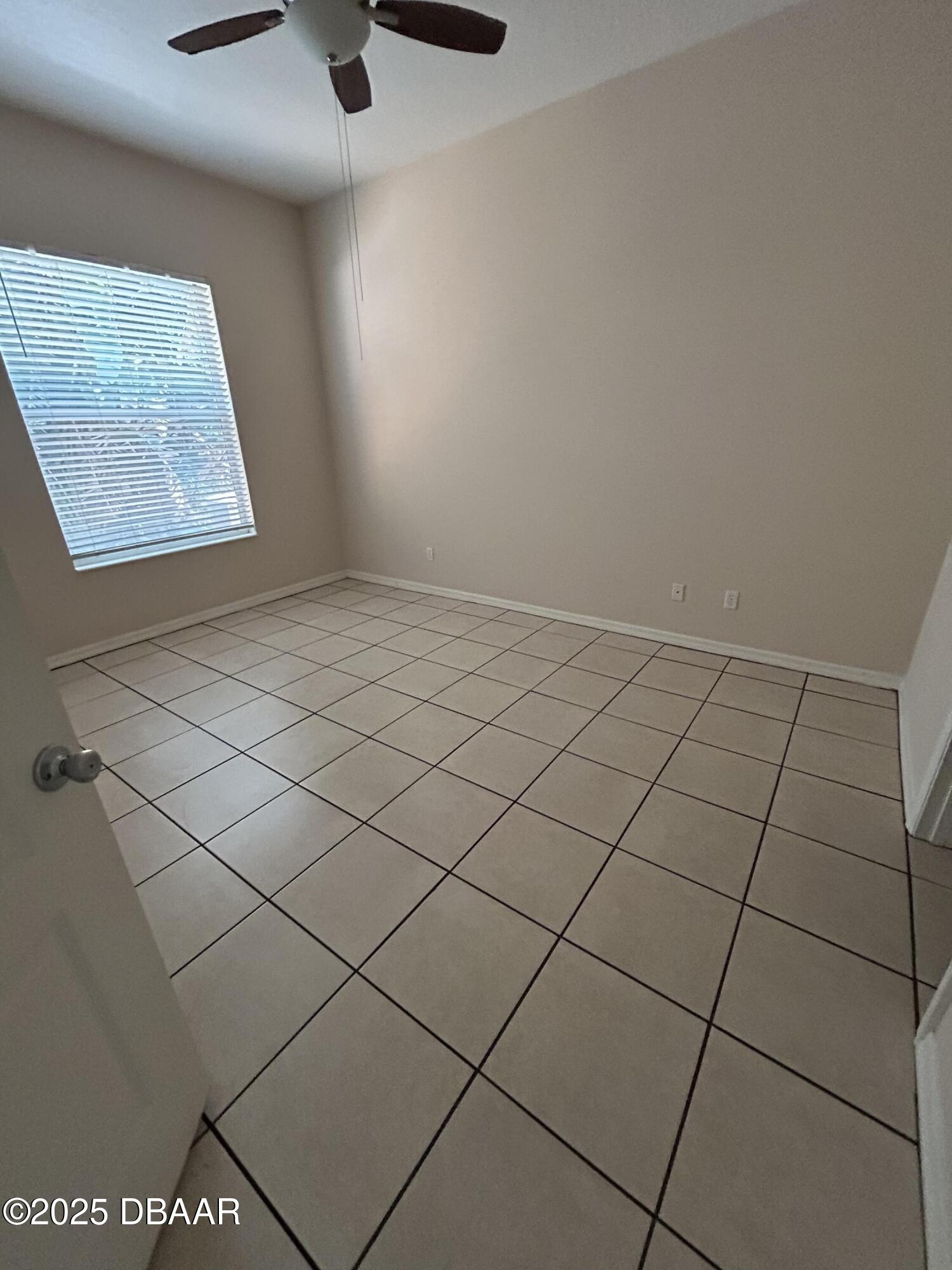 90 Buschman Drive Ponce Inlet, FL 32127 - Photo 34 of 37 a view of an empty room and a window