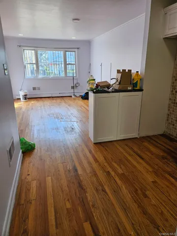 a kitchen with granite countertop a sink and a stove top oven
